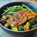 Spiced Salmon Bowl with Roasted Brussels, Sautéed Greens & Steamed Broccoli