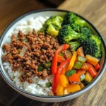 Spicy Ground Beef Stir-Fry Bowl with Garlic Veggies & Steamy Rice